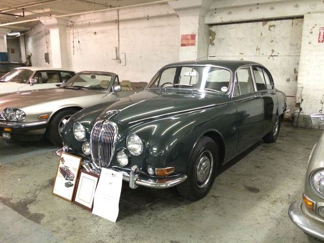 A dark green 1964 Jaguar 3.8 S. at the British Transportation Museum in Dayton, Ohio