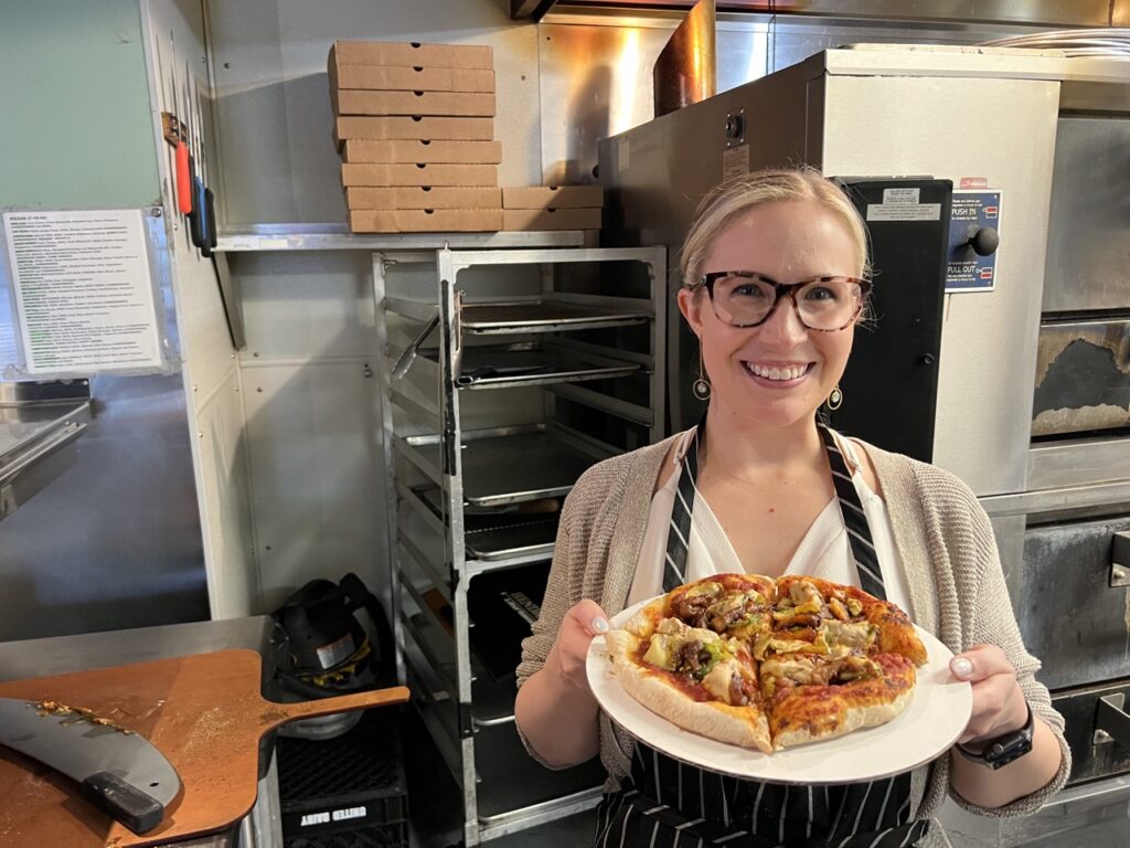 Me holding my pizza at Wheat Penny, Dayton, Ohio